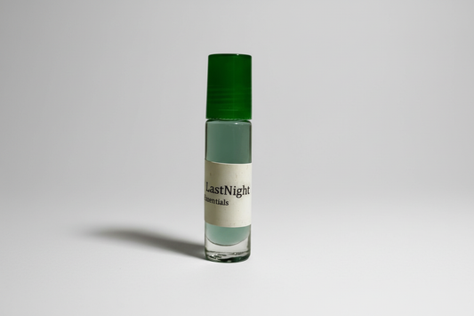 Last Night Body Oil with light gray background